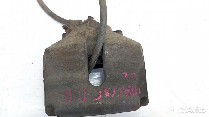 Суппорт передний правый VW Passat CC