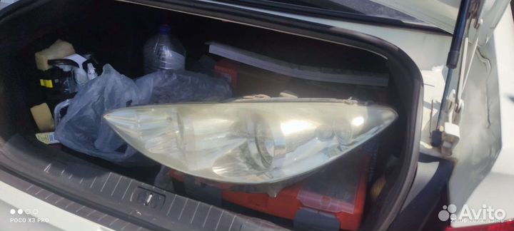 Фара левая Peugeot 408