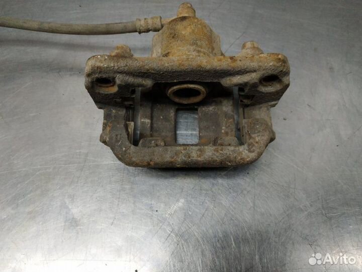 Суппорт задний правый Nissan X-Trail T31 MR20DE