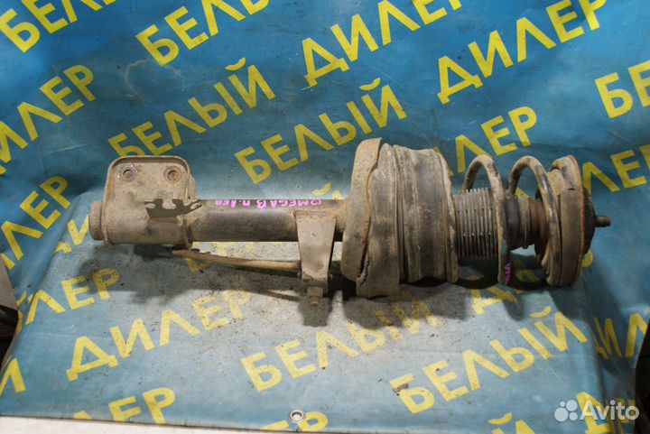 Передняя стойка подвески + пружина Opel omega B