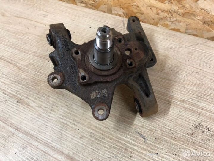 Поворотный кулак задний левый Ssangyong Actyon