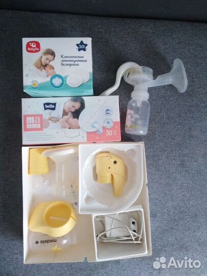 Молокоотсос medela электрический