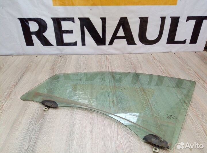 Стекло боковое двери Renault fluence Лев