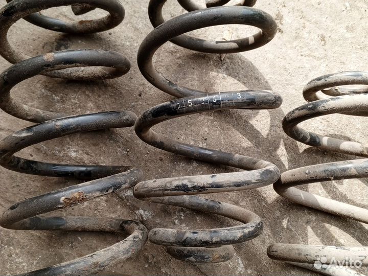 Стойки с пружинами