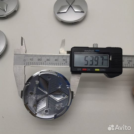 4шт Mitsubishi MR554097 комплект колпаков серебро