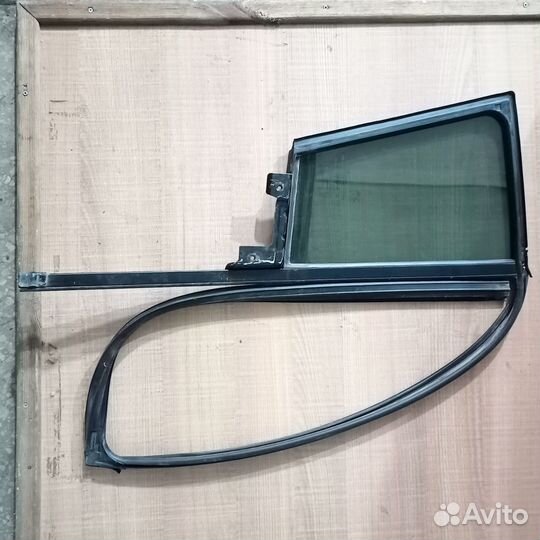 Стекло заднее левое Kia Sportage 3