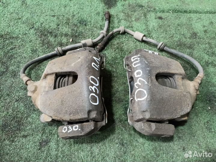 Суппорт тормозной передний правый Ford Focus II (2