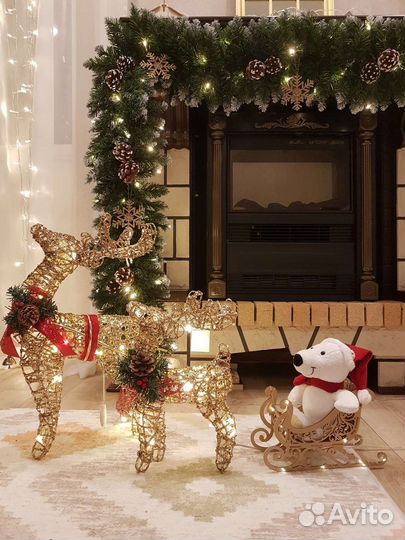 Олень с санями