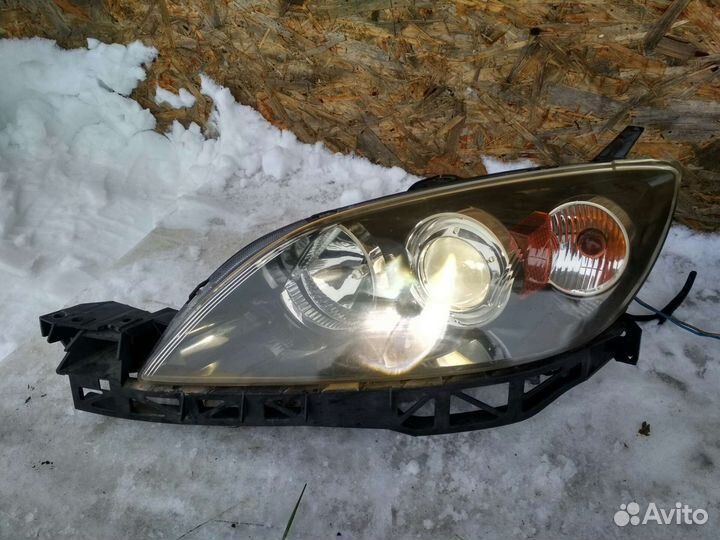 Фара левая Mazda 3 xenon