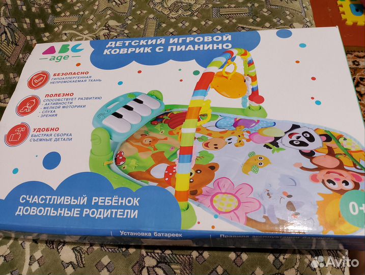 Развивающий коврик с пианино