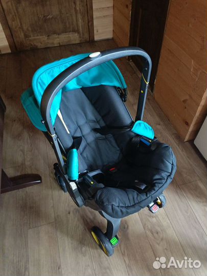 Автолюлька на колесах для новорожденных