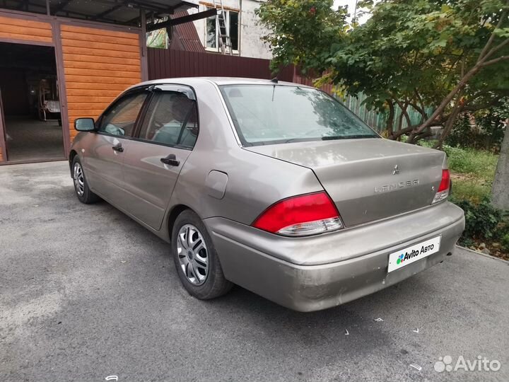 Mitsubishi Lancer 2.0 AT, 2001, 250 000 км