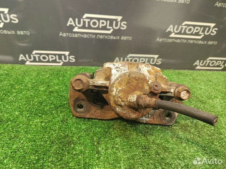 Суппорт передний правый Kia Shuma 2 седан 1.6 S6D