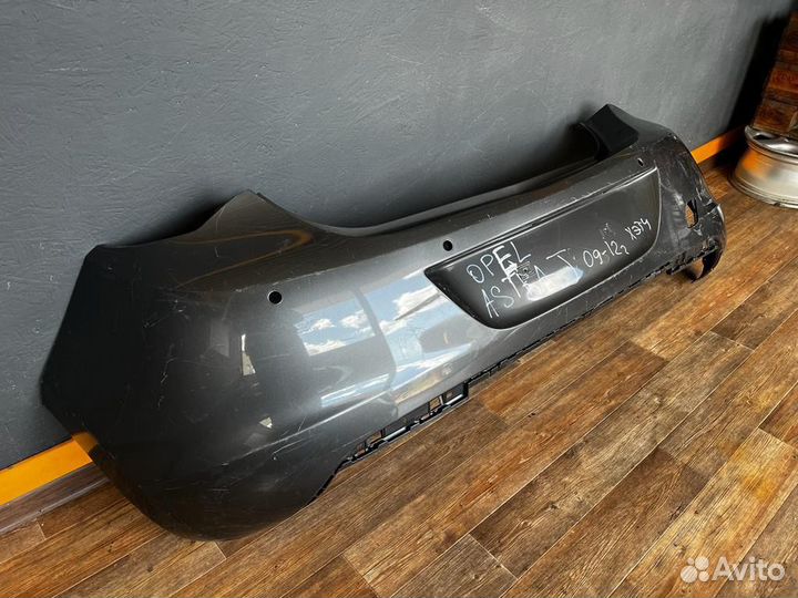 Задний бампер Opel Astra J