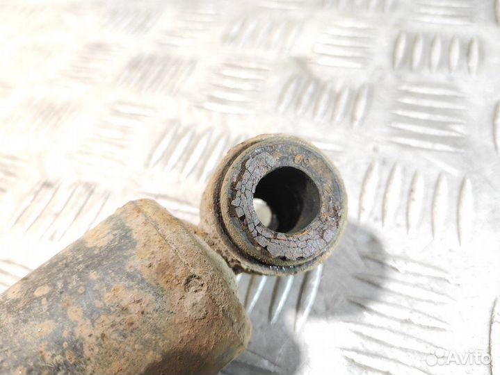 Амортизатор задний левый Mitsubishi L200 2006-2016