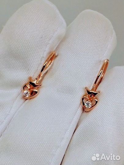Золотые серьги с камнем