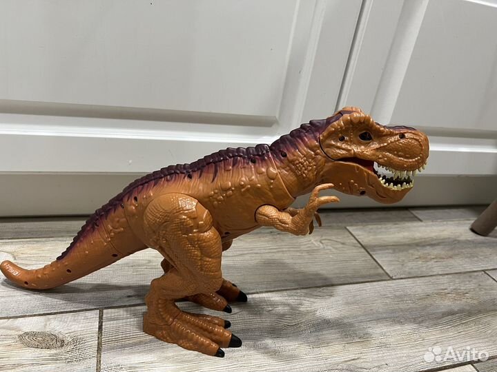 Игрушка динозавр