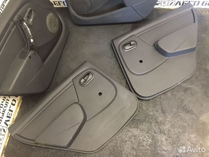 Обшивка двери Logan 2005-2014