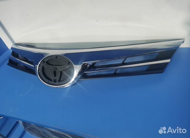 Решетка радиатора Тойота Королла 180