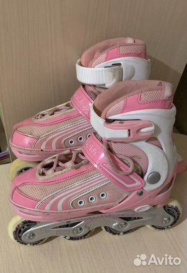 Роликовые коньки