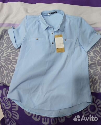 Блузка голубая