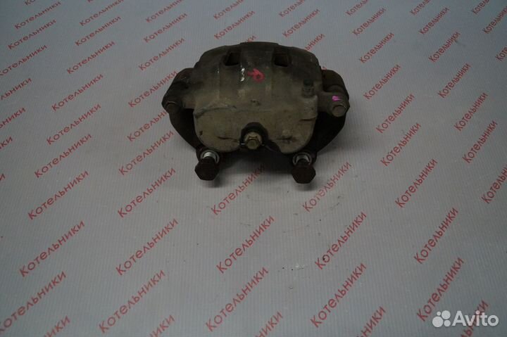 Nissan 41001-WF100 Суппорт тормозной правый