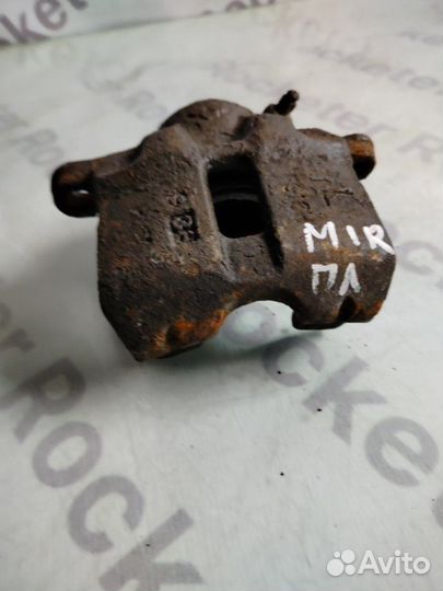 Суппорт тормозной передний левый Mitsubishi Mirage