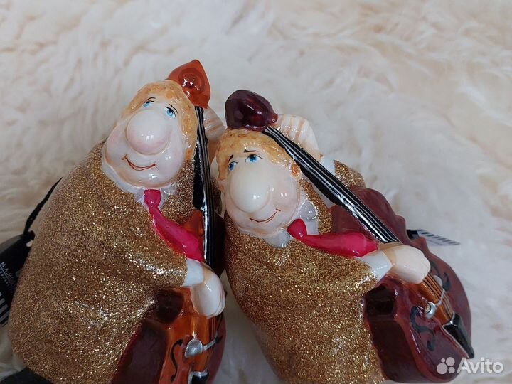 Виолончелист елочная игрушка Моstowski