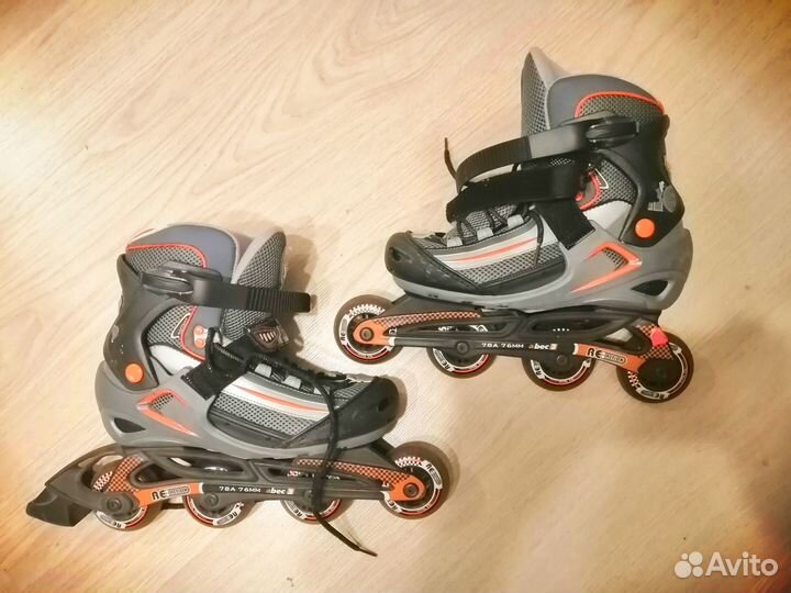 Роликовые коньки