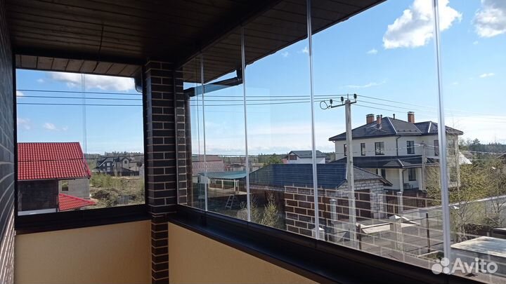 Безрамное раздвижное остекление