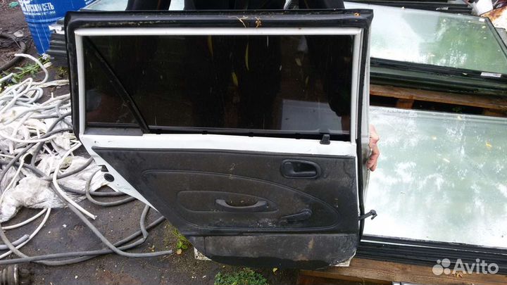 Двери на toyota corolla AE100 5аfe