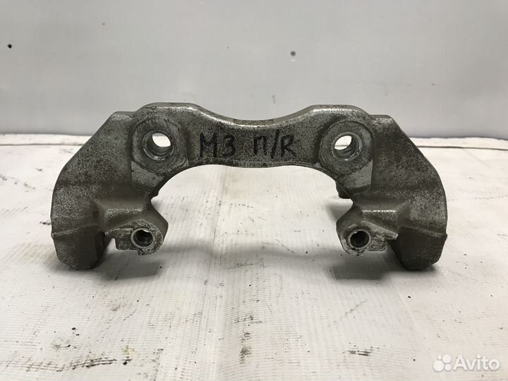 Скоба суппорта переднего правого Mazda 3BL