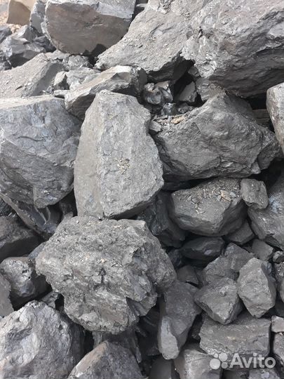 Уголь просеянный в мешках