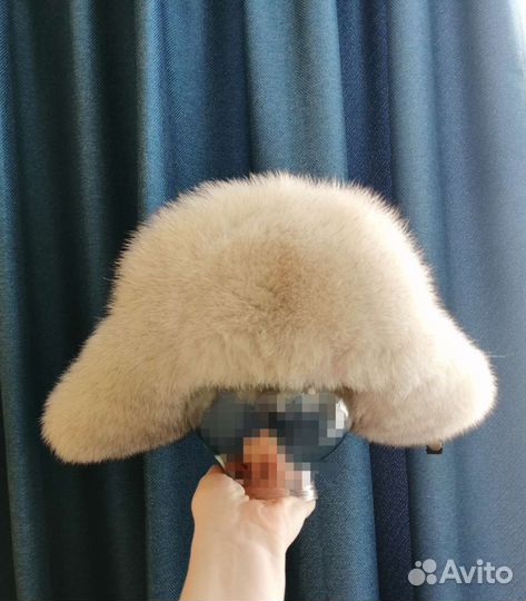 Женские меховые шапки