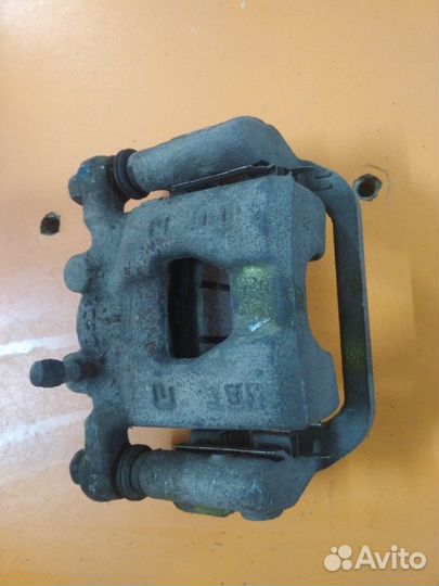 Суппорт задний левый Nissan Qashqai J10