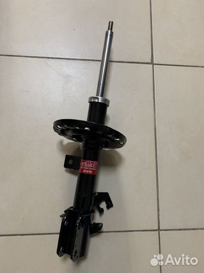 Амортизатор передний правый Nissan Micra K12