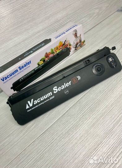 Вакуумный упаковщик