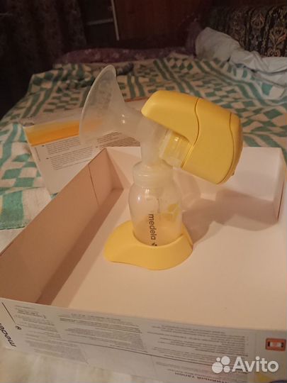 Молокоотсос электрический Medela mini electric