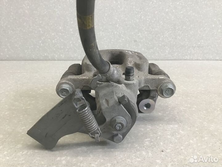 Суппорт задний левый Kia Cerato 2018