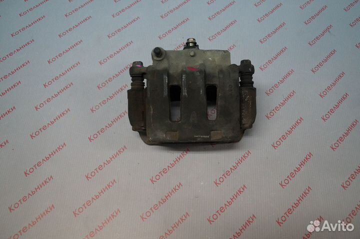 Nissan 41001-WF100 Суппорт тормозной правый