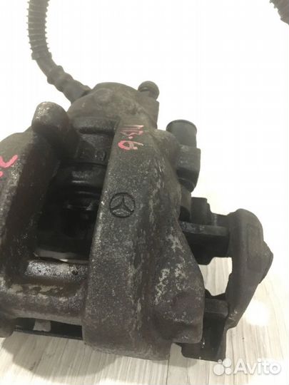Суппорт тормозной задний левый Mercedes Benz E240