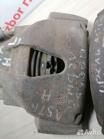 Суппорт передний Opel Astra H