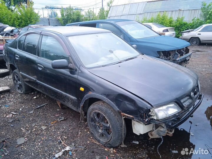Заднее ветровое стекло Nissan Primera P11