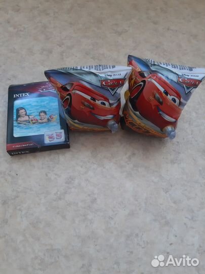 Нарукавники и жилет для плавания