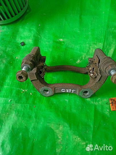 Рено Сценник 3 скоба суппорта заднего