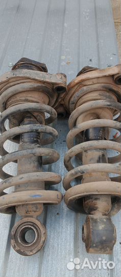 Задний амортизатор Ниссан wingroad