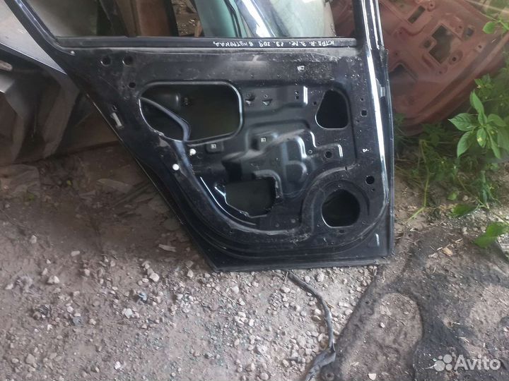 Задняя левая дверь на опель астра н 13года