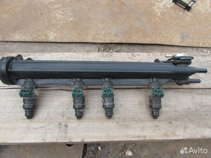 06A133317A Распределитель топлива (рампа)