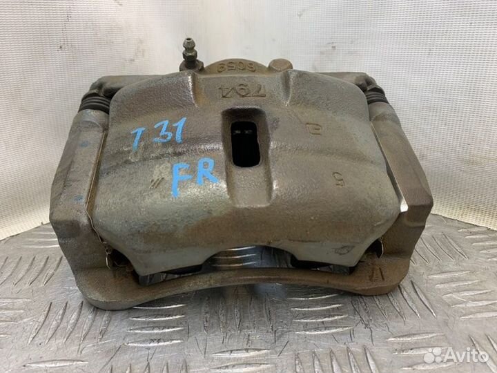 Суппорт тормозной передний правый Nissan X-Trail