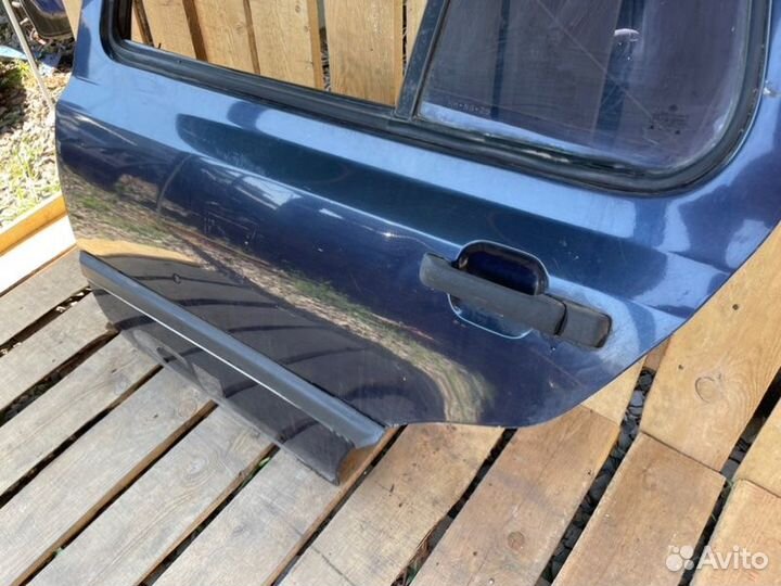 Дверь задняя левая Volkswagen Vento седан ABU 1993